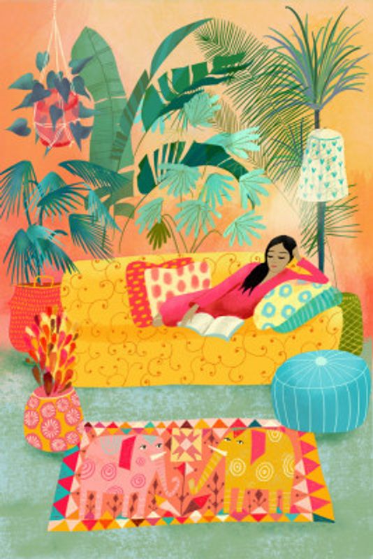 Woman Reading In Tropical Living Room