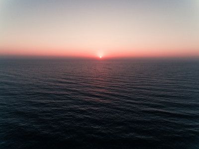 Ocean Sunset With A Soft Gradient Sky