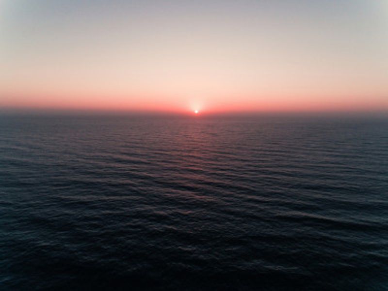 Ocean Sunset With A Soft Gradient Sky