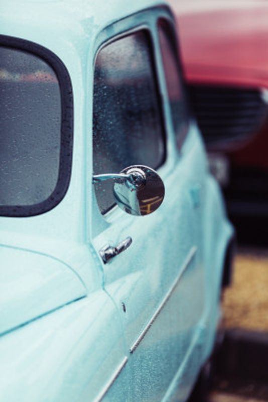 Vintage Blue Car with Raindrops