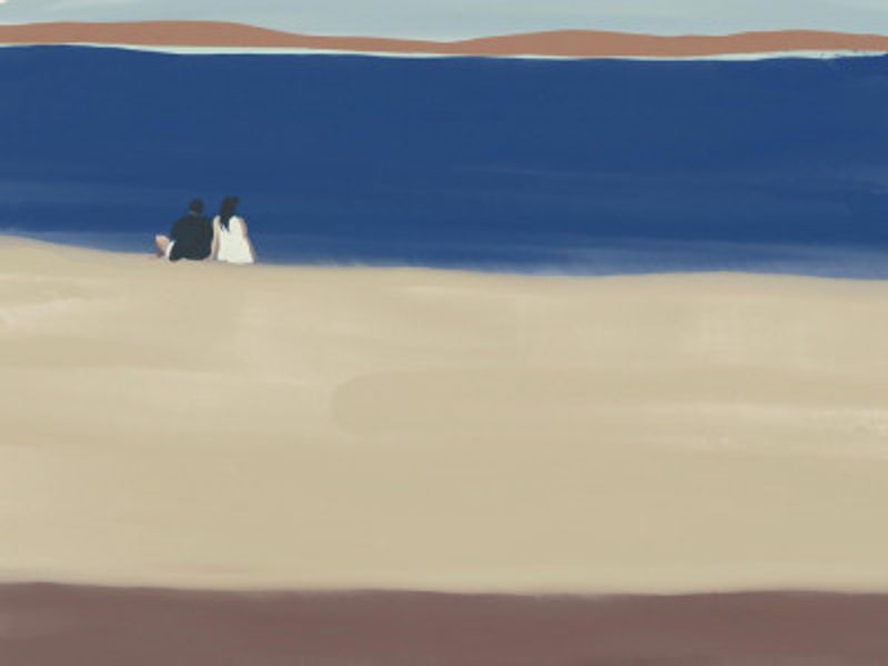 Couple Sitting by the Sea