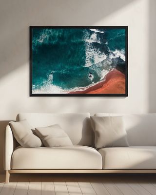 Ocean Waves Crashing Onto A Sandy Beach