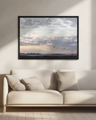 Hot Air Balloons Floating Across A Vast Desert