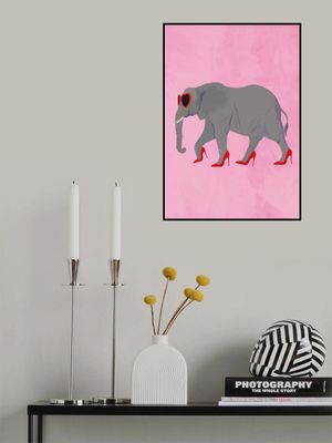 Elephant in heels and heart glasses