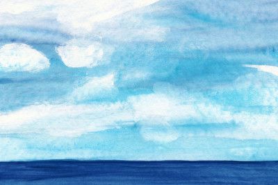 A Tranquil Blue Ocean with Cloudy Skies