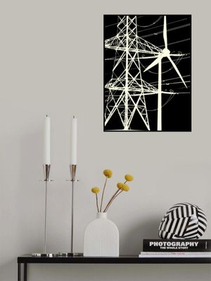 Silhouette of a Wind Turbine and Power Lines
