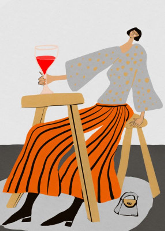 Just one glass.  Lady drinking wine