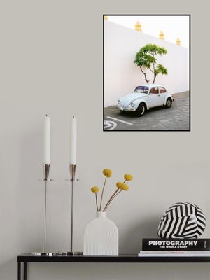 Pastel Volskwagen Beetle in the streets of Oaxaca Mexico