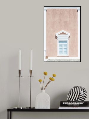 Pink wall and a pediment