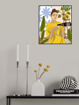 Woman In A Yellow Shirt Pouring Wine