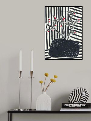 Black and white still life with berries and stripes