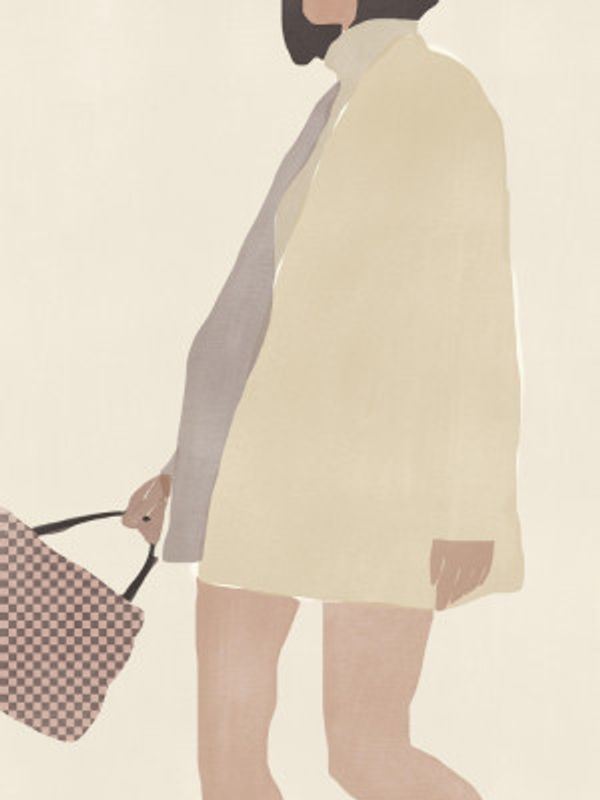 Stylish Figure Holding a Patterned Handbag