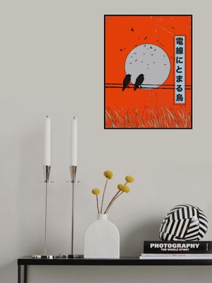 Birds Perched on a Wire