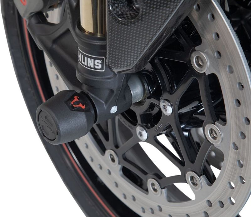 Kraschpuckar hjulaxel fram SW-Motech svart Triumph 11-upp, Yamaha 19-upp, Royal Enfield 24-upp