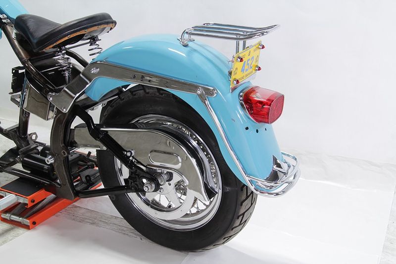 List bakskärm Wyatt Gatling krom Evo Softail