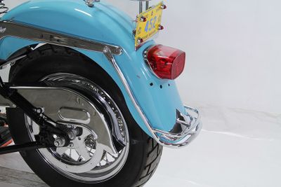 List bakskärm Wyatt Gatling krom Evo Softail