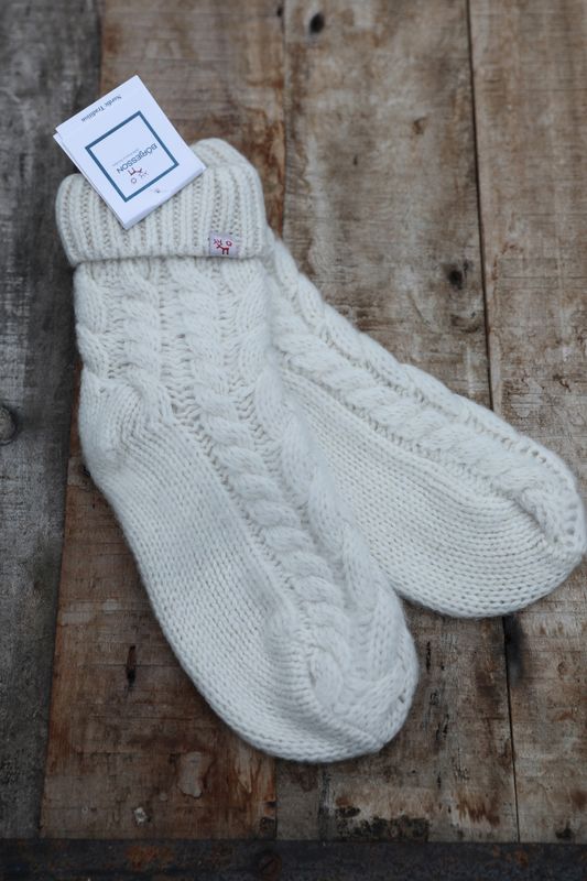 Soft, cable-knit wool socks made from Shetland wool by Bloomingshop