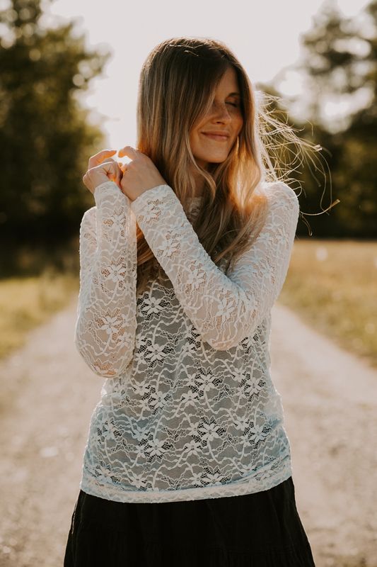 Romantisk cremevit spetstop