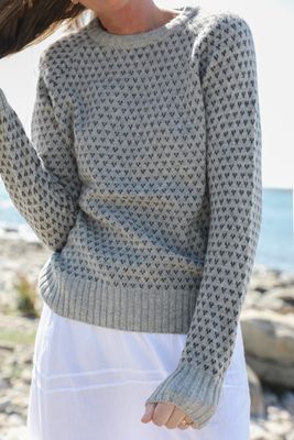 Gray wool sweater with a Scandinavian pattern