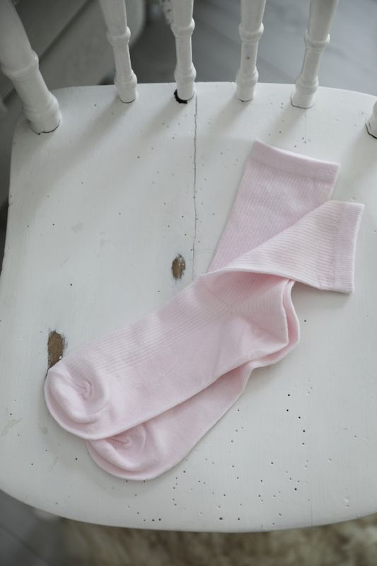 Ribbade rosa strumpor