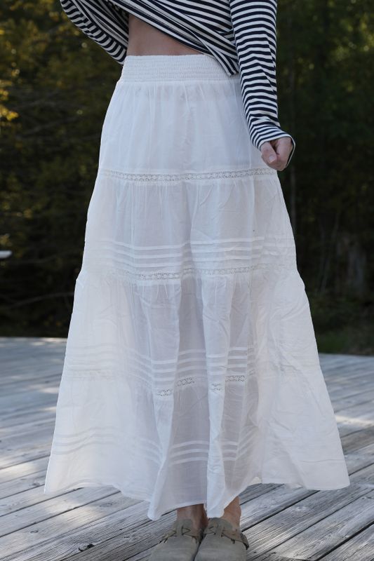 White romantic long cotton skirt with lace and smocking at the waist from Bloomingshop