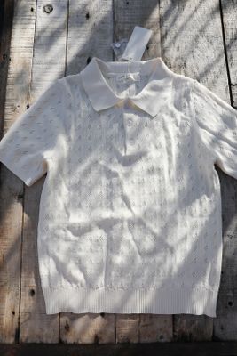 Knitted top with a collar