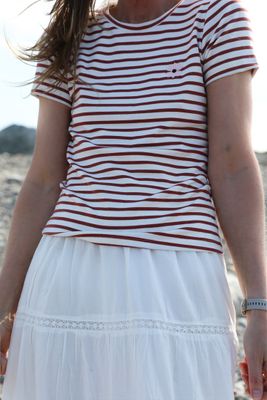 Striped top with embroidered flower
