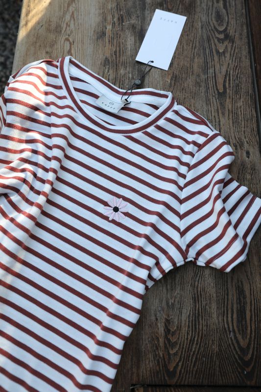 Striped top with embroidered flower