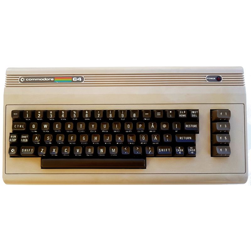 COMMODORE 64 MED SVENSKT TANGENTBORD LÅGT SERIENUMMER