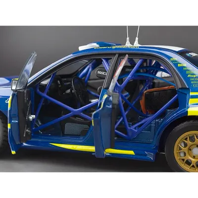 Subaru Impreza WRC07 - #232 Colin McRae - Sun Star - 1:18