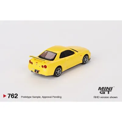 Nissan Skyline GT-R (R34) V-Spec - Gul 762 - Mini GT - 1:64