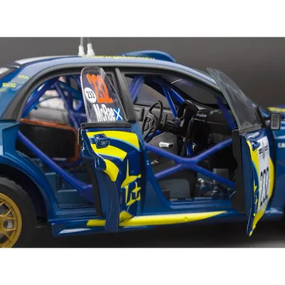 Subaru Impreza WRC07 - #232 Colin McRae - Sun Star - 1:18