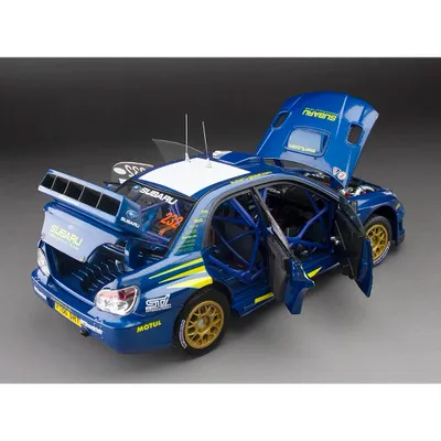 Subaru Impreza WRC07 - #232 Colin McRae - Sun Star - 1:18