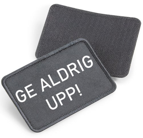 Ge Aldrig Upp - tygpatch med kardborre (Graphite gray Onesize)