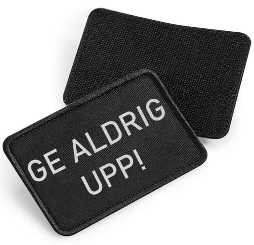 Ge Aldrig Upp - tygpatch med kardborre (Black Onesize)