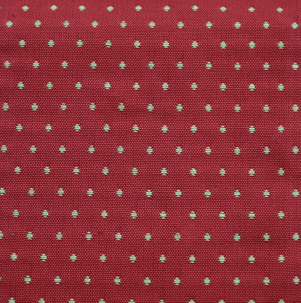 Prickigt möbeltyg i rött och gul-grönt | Broarne.se