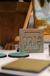 Ärgade och rostade föremål från Crias patinaevent