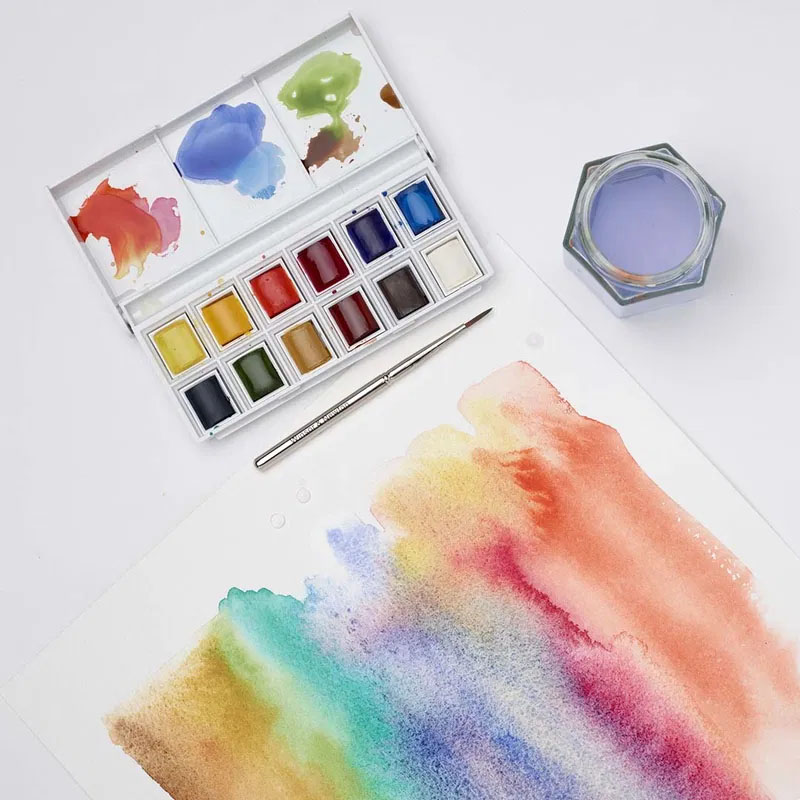 Bild med många olika färger från ett kit med akvarell från Winsor & Newton Cotman