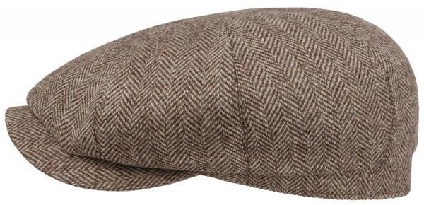 Beige Hatteras med bruna skiftningar, rund åttapanelskrona och kort böjd skärm