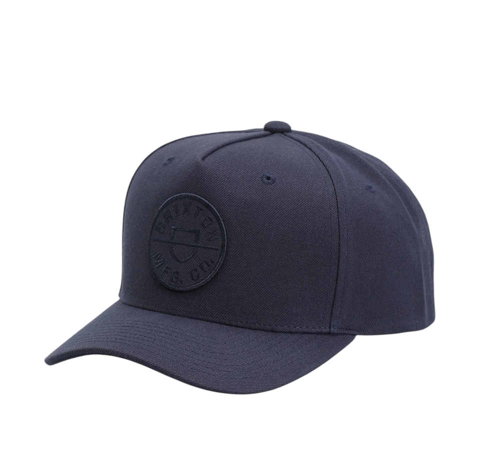 Brixton Crest MP Snapback Washed Navy keps i washed navy med broderad Crest-patch och böjd skärm.