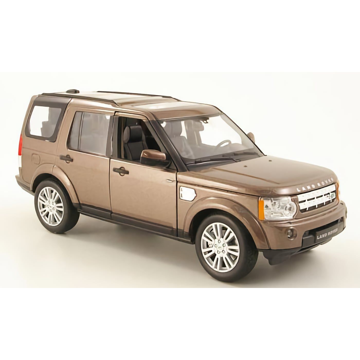 Läs mer om Land Rover Discovery 4 - Brun - Welly - 1:24